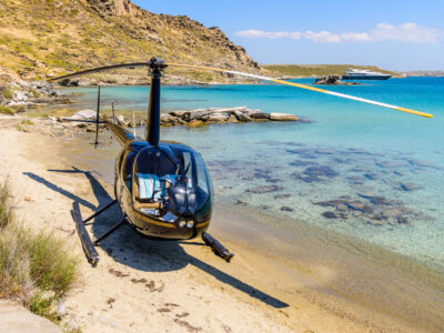 Small private helicopter on the beach of Paros island, Cyclades, Small private helicopter on the beach of Paros island, Cyclades, Greece.